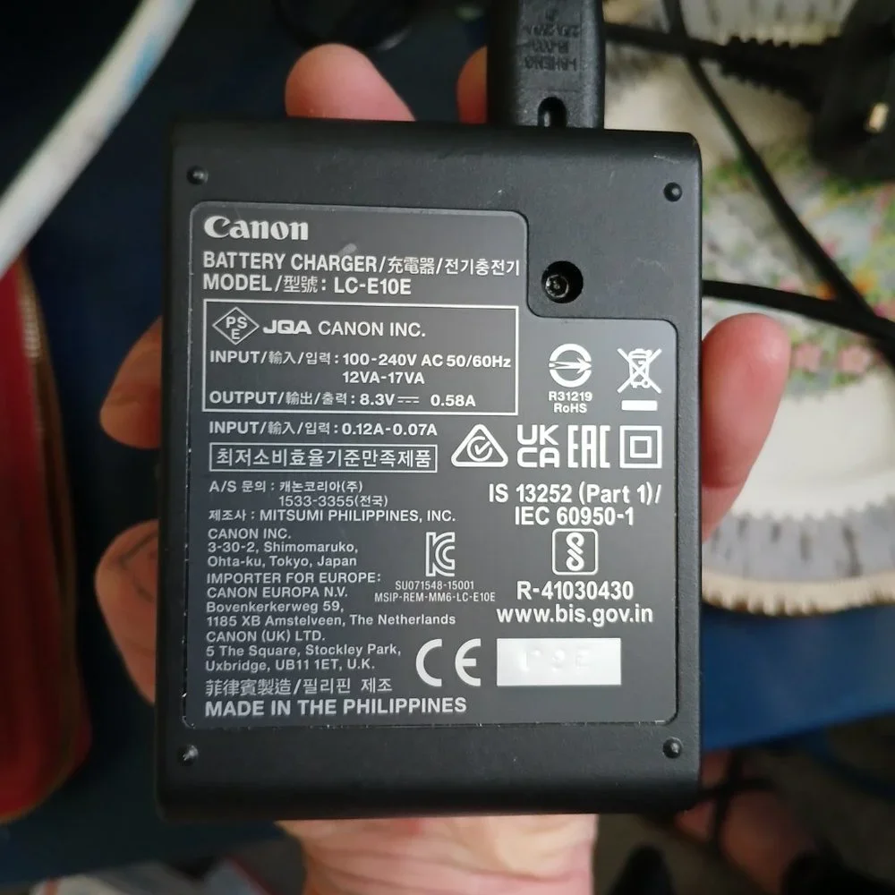 Canon LC-E10E Battery Charger UK/CA/EAC 100-240v, AC 50/60Hz 12VA - 17VA